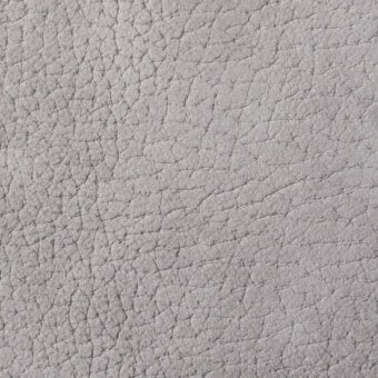 Light gray nubuck leather texture with a heavily pebbled surface, featuring fine lines and raised bumps in a matte finish.
